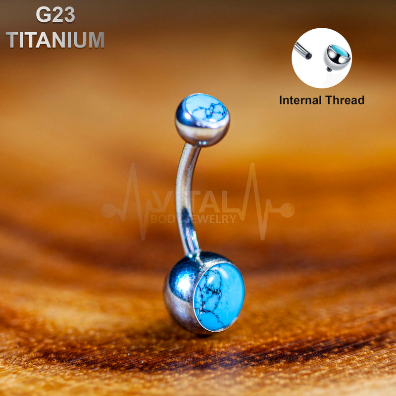 14G G23 titanium belly ring with turquoise stones, featuring internally threaded design for smooth insertion and comfort.