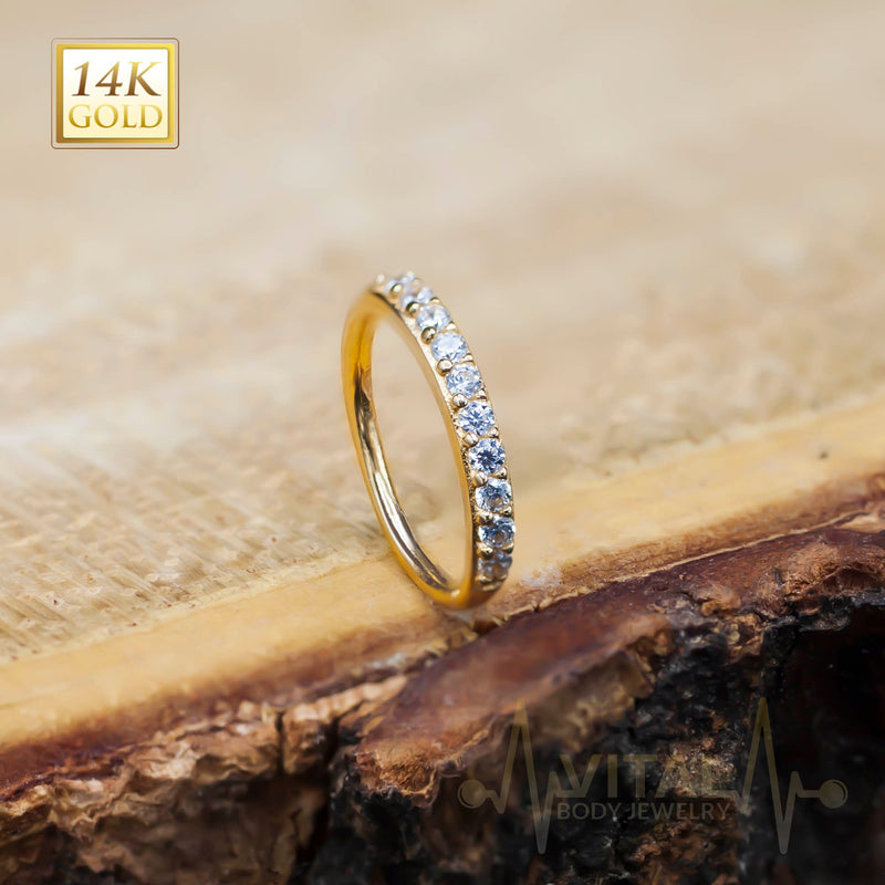 20G 14K gold bendable nose hoop ring with 10 clear cubic zirconia gems for added sparkle and customizable fit