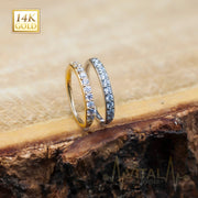20G 14K gold bendable nose hoop ring with 10 CZ gems for a touch of sparkle and customizable fit for comfort.