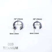 14G titanium septum ring in a horseshoe design with spike ends, ideal for comfortable and stylish piercing wear.