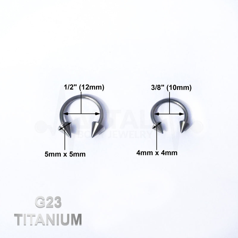 14G titanium septum ring in a horseshoe design with spike ends, ideal for comfortable and stylish piercing wear.