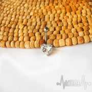 14G surgical steel belly ring with heart shape cubic zirconia gem, designed for non-dangle wear and easy installation.
