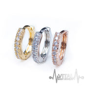 18G surgical steel hinged hoop earrings with cubic zirconia stones, designed for versatile wear on nose, ears, or cartilage.