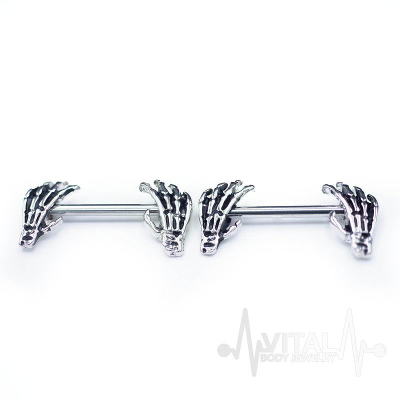 14G surgical steel nipple rings with unique skeleton hand design for striking body jewelry style and comfort