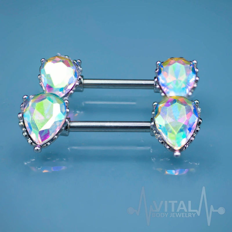 14G surgical steel nipple bars with double front-facing cubic zirconia gems in teardrop prong settings for a dazzling shine.