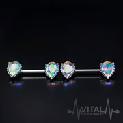 14G surgical steel nipple bars with double front-facing cubic zirconia gems in teardrop settings for enhanced sparkle.