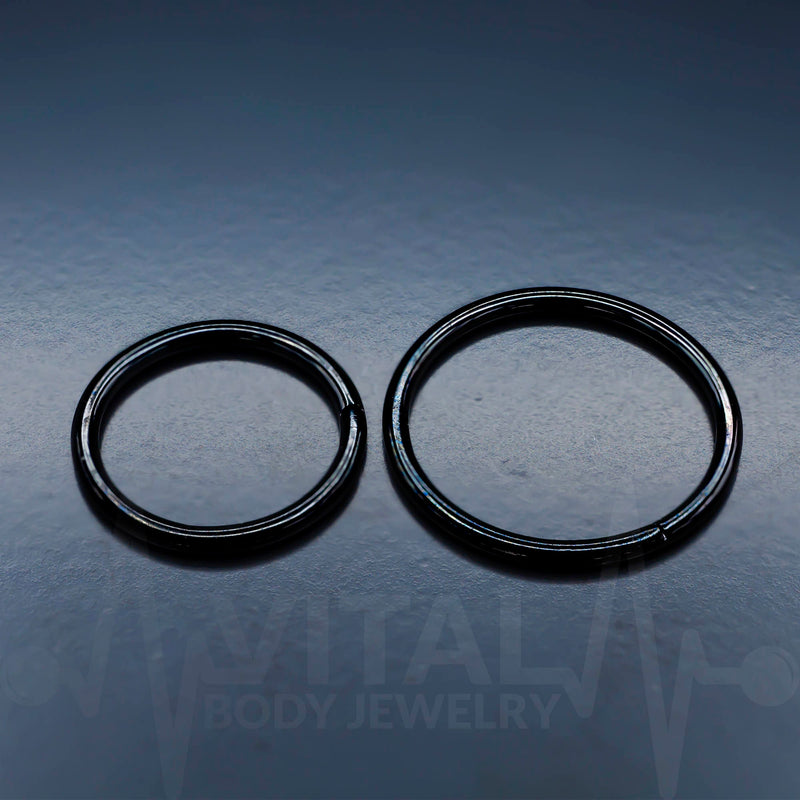 20G titanium hinged nose ring with seamless design, featuring a smooth finish for comfort and versatility in various piercings.