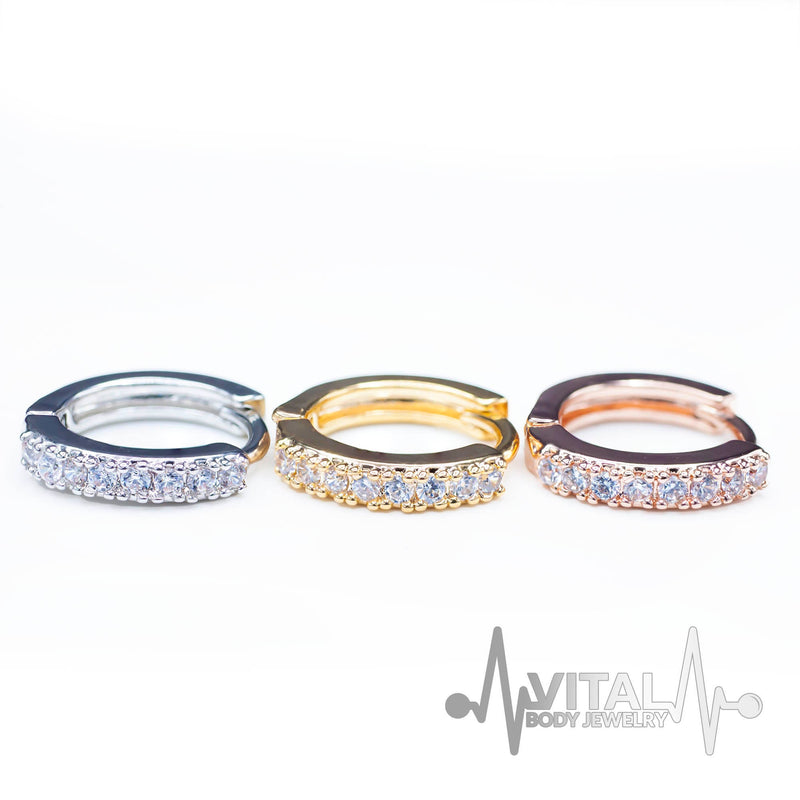 18G surgical steel hinged hoop earrings with sparkling cubic zirconia stones, designed for comfortable wear on nose, ears, or cartilage