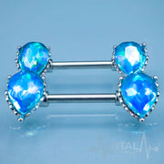 14G surgical steel nipple bars with aqua cubic zirconia gems featuring a teardrop design and an Aurora Borealis effect.