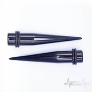 12G black acrylic ear stretchers with rubber o-rings for a secure fit and lightweight design, perfect for comfortable stretching.