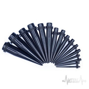 12G black acrylic ear stretchers with lightweight design and rubber o-rings for a secure fit during ear stretching.
