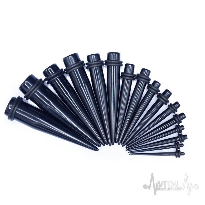 12G black acrylic ear stretchers with lightweight design and rubber o-rings for a secure fit during ear stretching.