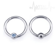 16G surgical steel hinged nose ring with fixed ball, ideal for comfortable and secure wear in nostrils and multiple piercings.