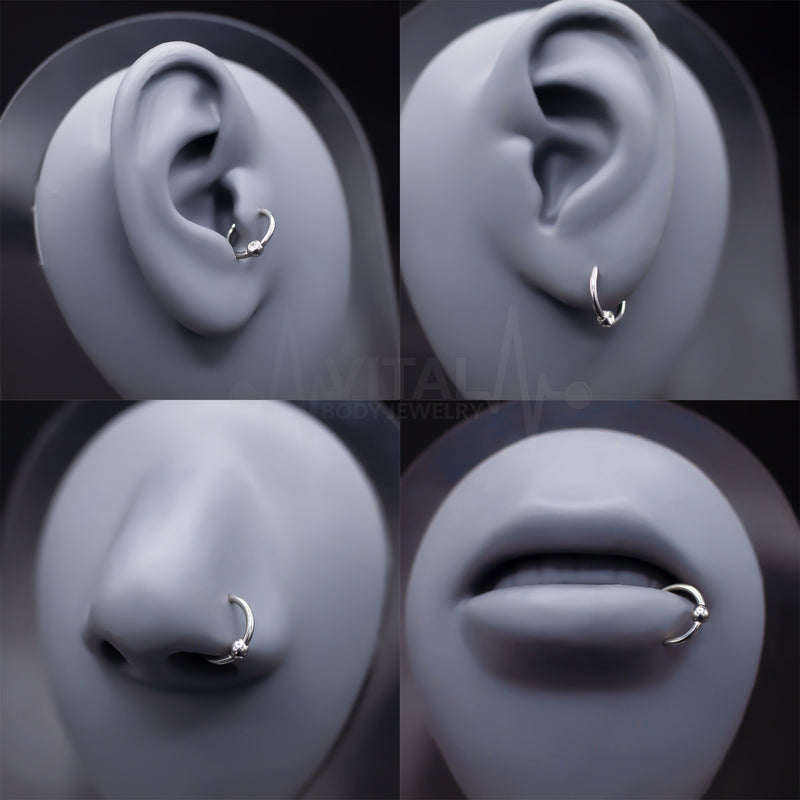 16G surgical steel hinged nose ring with fixed ball, for easy wear and secure fit during daily activities.