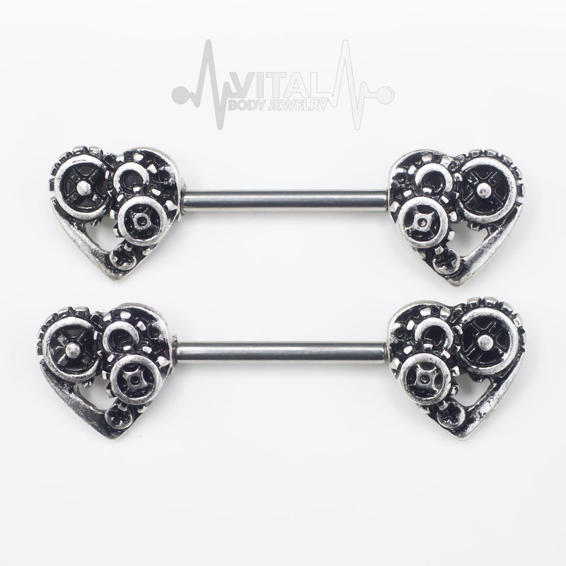 14G surgical steel nipple barbell with steampunk heart design in antique gold and silver finishes for unique style and comfort