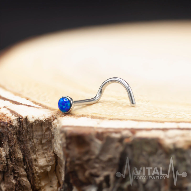 20G surgical steel corkscrew nose ring with multicolor opal for a vibrant and secure fit.