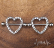 14G surgical steel nipple shields with heart design and cubic zirconia gems for a romantic touch and secure fit