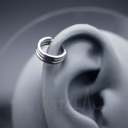 16G surgical steel hinge ring with triple layered design, PVD coating for a stylish finish, perfect for helix or nostril piercings