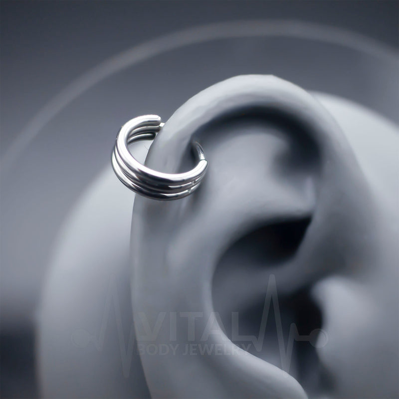 16G surgical steel hinge ring with triple layered design, PVD coating for a stylish finish, perfect for helix or nostril piercings