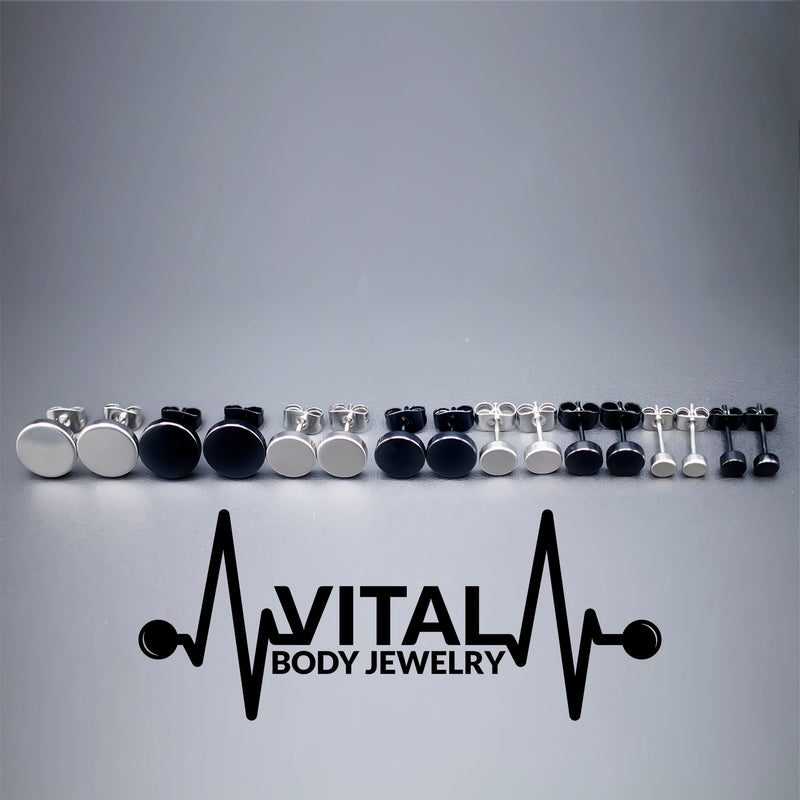 16G PVD coated surgical steel fake plugs with a sleek black finish, designed to resemble larger gauge earrings without the commitment of stretching.