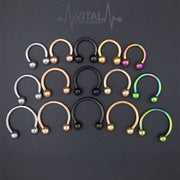 16G surgical steel horseshoe septum ring with PVD coated black finish and 3mm ball ends for comfortable everyday wear
