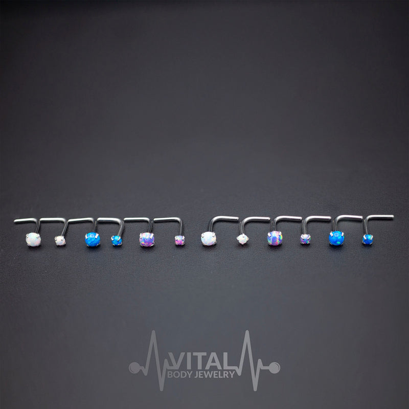 18G and 20G surgical steel L-bend nose ring with 2mm and 3mm opal gems for a secure and stylish fit.