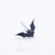 20G surgical steel L-bend nose stud with whimsical bat design, crafted for comfort and secure fit