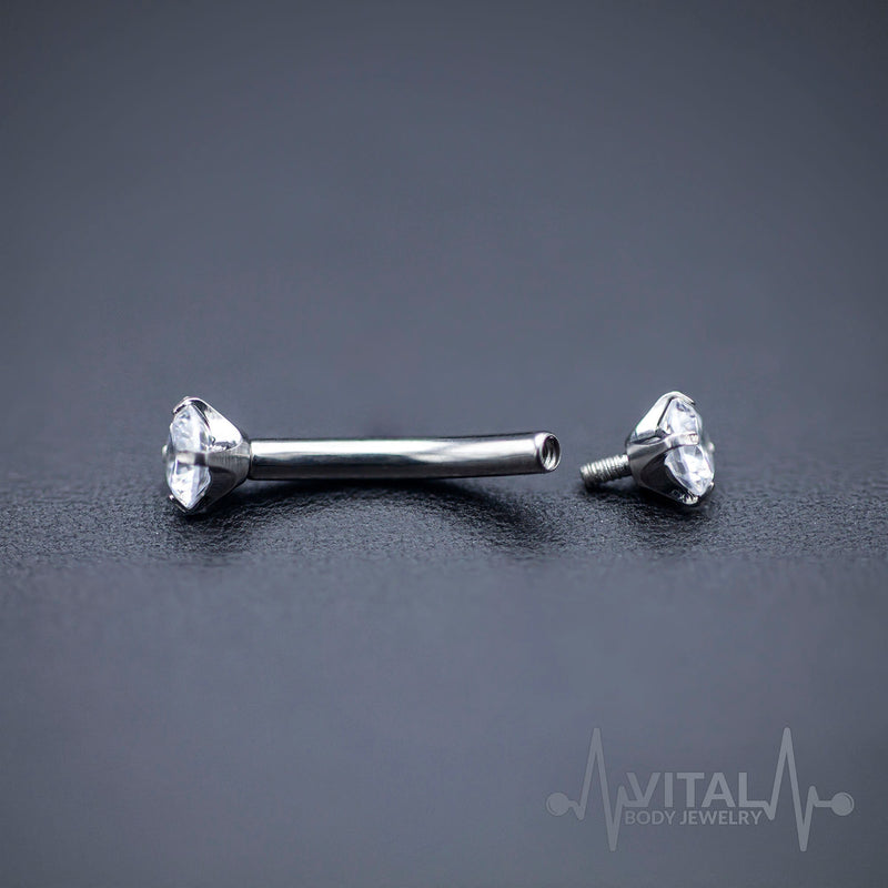 16G titanium curved eyebrow barbell with CZ gem balls for a stylish and comfortable piercing experience