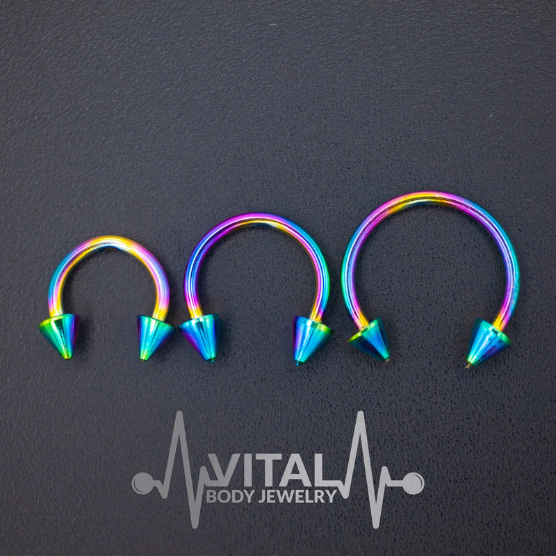 16G surgical steel septum ring with spike ends, PVD coated for durability and available in various diameters for a perfect fit