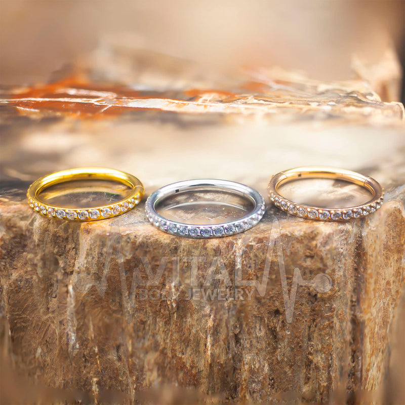 18G surgical steel hinged nose ring with CZ paved stones for a sparkling and elegant design