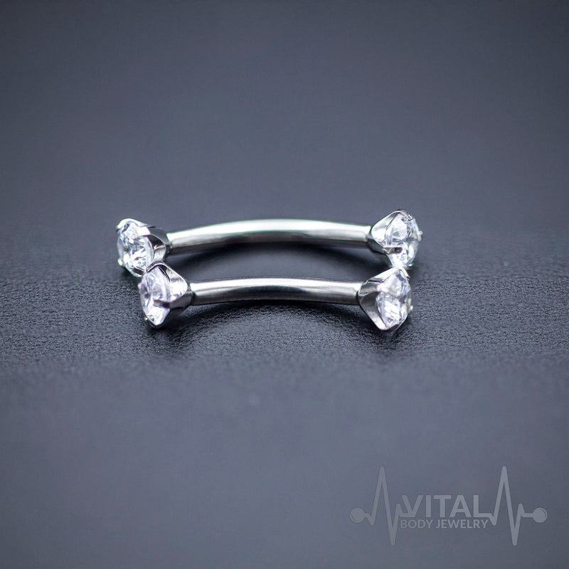 16G titanium curved eyebrow barbell with CZ gem balls for a sparkling and stylish look