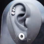 16G surgical steel labret stud with prong set CZ gem, featuring an internally threaded design for comfortable wear and secure fit.