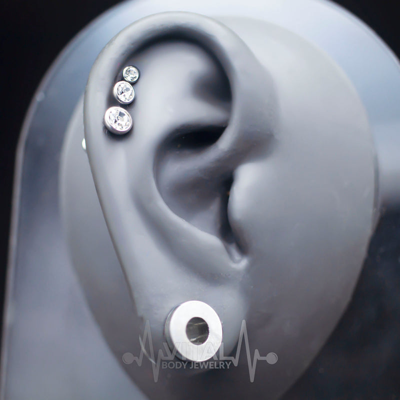 16G surgical steel labret stud with prong set CZ gem, featuring an internally threaded design for comfortable wear and secure fit.