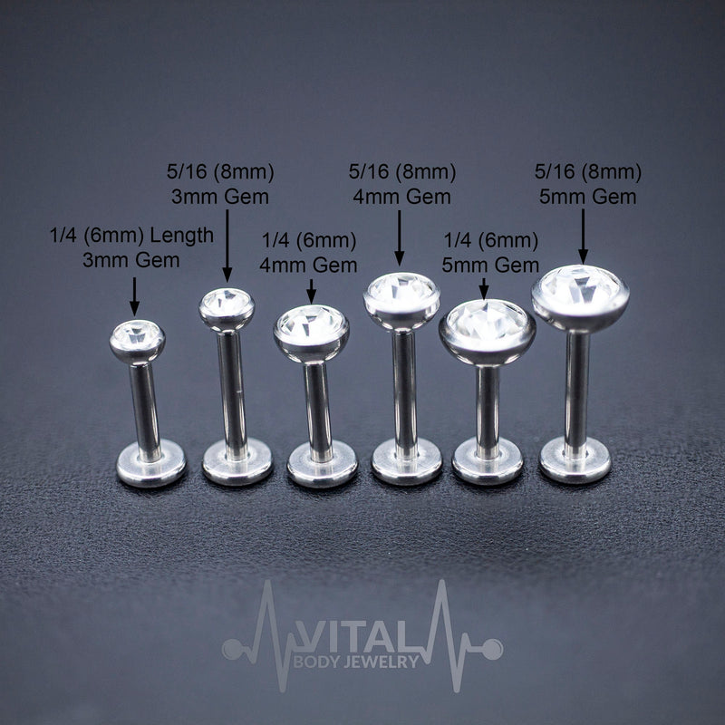 16G surgical steel labret stud with prong set CZ gem, available in multiple lengths and ball sizes for customizable style