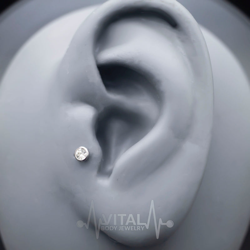 16G surgical steel labret stud with prong set cubic zirconia gem, available in various lengths and ball sizes for comfortable wear