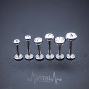 16G surgical steel labret stud with prong set cubic zirconia gem, featuring an internally threaded design for comfort and smooth insertion