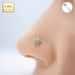 16G 14k gold threadless labret with clear cubic zirconia flower top, designed for comfortable and secure body piercings