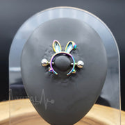 14G surgical steel nipple shields with playful bunny design, ensuring comfort and irritation-free wear for sensitive skin, sold as a pair.