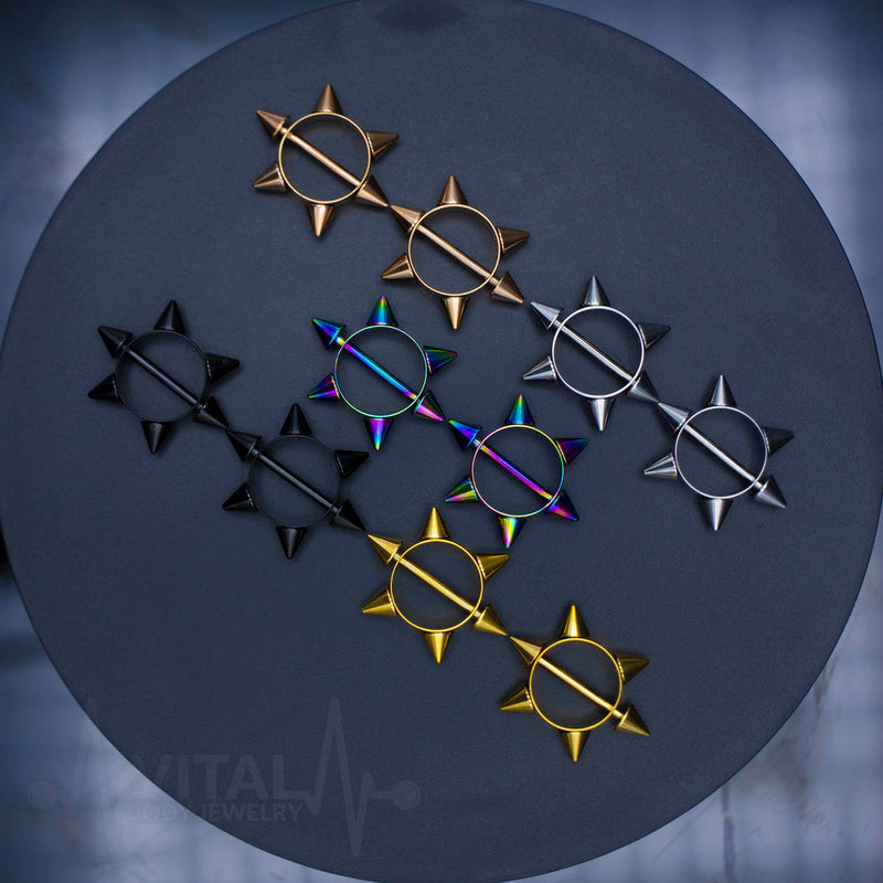 14G surgical steel nipple shields with a 6 point spike star design for an edgy look and secure fit