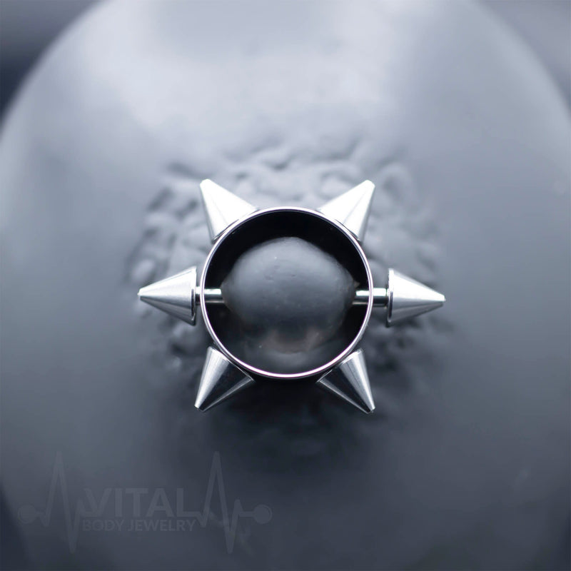 14G surgical steel nipple shields with 6 Point Spike Star design for edgy style and secure fit