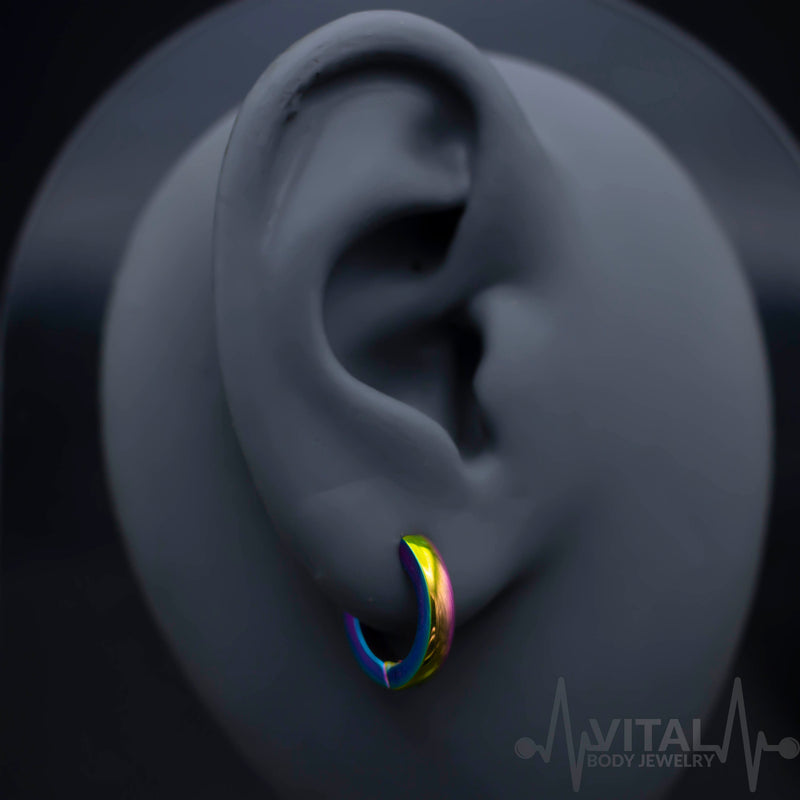 20G surgical steel huggie hoop earrings with dome design available in black, silver, gold, and rainbow colors for a stylish accessory.