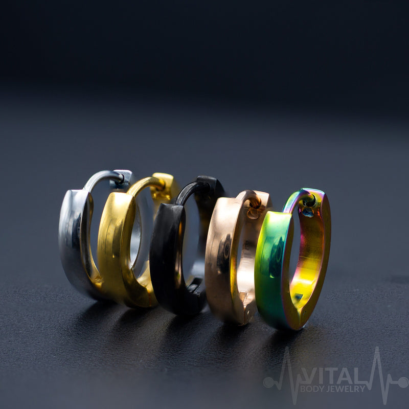 20G surgical stainless steel huggie hoop earrings with dome design, available in black, silver, gold, and rainbow colors.