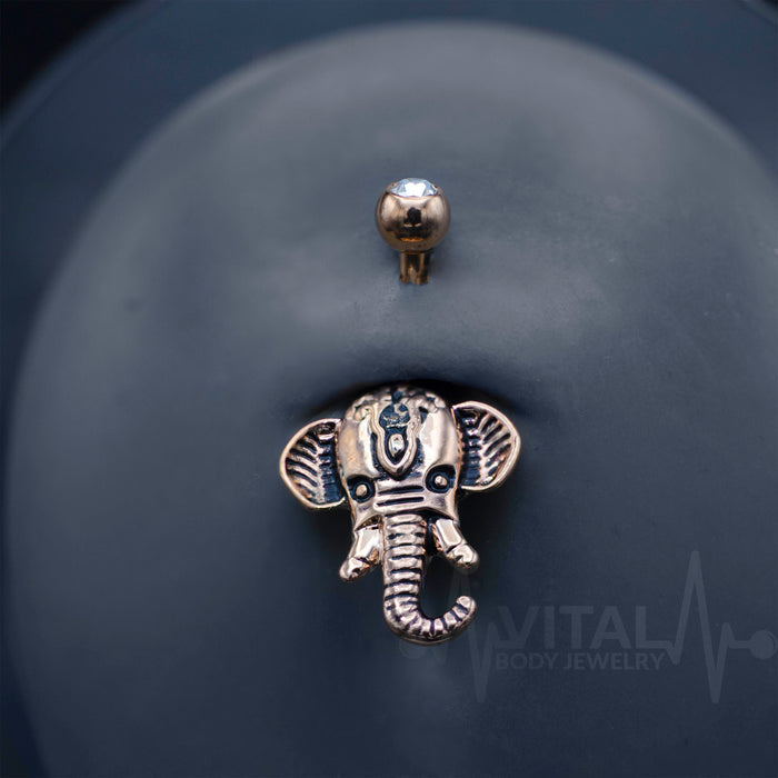 14G surgical steel belly ring featuring an elephant design, ideal for sensitive skin with a secure externally threaded fit. Available in rose gold, gold, and silver.