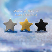 14G titanium dermal tops in star shape with PVD coating in gold, black, and silver for versatile piercings