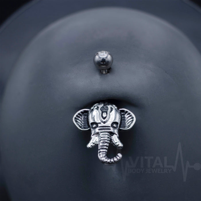14G surgical steel belly ring with elephant design, 15.2mm wide and 17.7mm high, in rose gold, gold, and silver colors, suitable for sensitive skin.