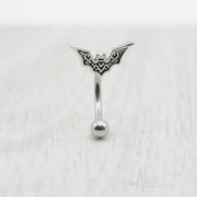 16G surgical steel eyebrow ring with bat design, featuring 10mm bat charm and 3mm ball end for a unique look