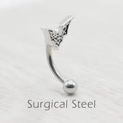 16G surgical steel eyebrow ring with bat design, featuring a 10mm bat charm and 3mm ball end for a unique piercing style