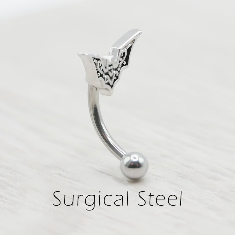 16G surgical steel eyebrow ring with bat design, featuring a 10mm bat charm and 3mm ball end for a unique piercing style