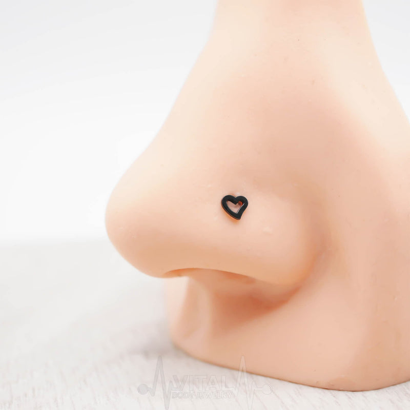 20G surgical steel L-bend nose ring with a heart stud for a charming and secure fit suitable for everyday wear.