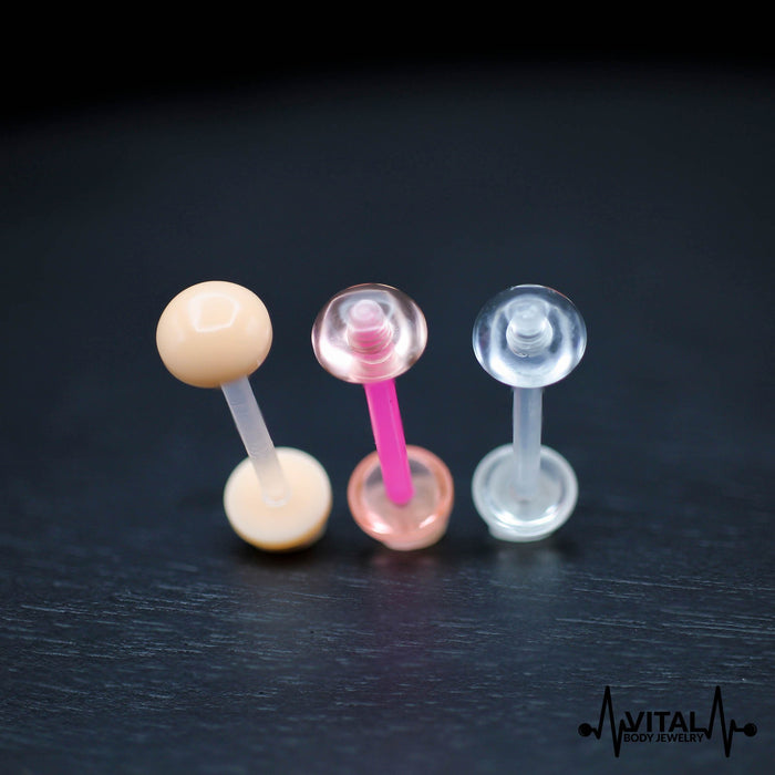 14G Bio Flex/Acrylic tongue barbell with a 6mm ball, flexible design in pink for comfort and ease during healing